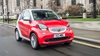 Red Smart ForTwo driving