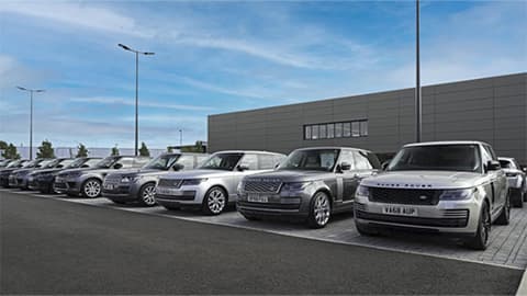 Row of Land Rovers sitting outside Land Rover Nottingham dealership