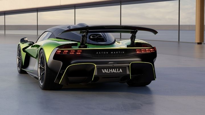 Green Aston Martin Valhalla parked with its back towards the camera