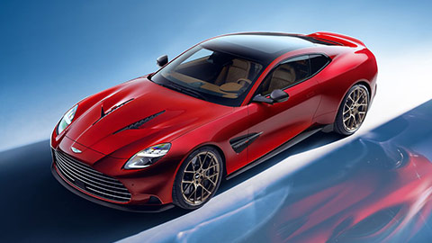 Red Aston Martin Vanquish front quarter aerial shot