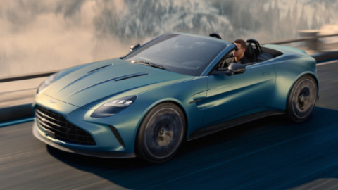 Aston Martin Vantage Roadster Driving Front Mountain Road