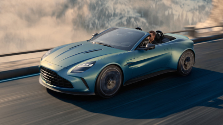 Aston Martin Vantage Roadster Driving Front Mountain Road