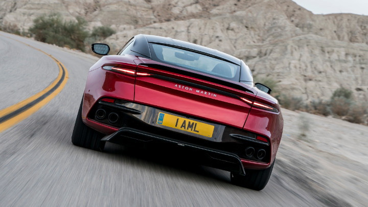 Red Aston Martin DBS Exterior Rear Driving