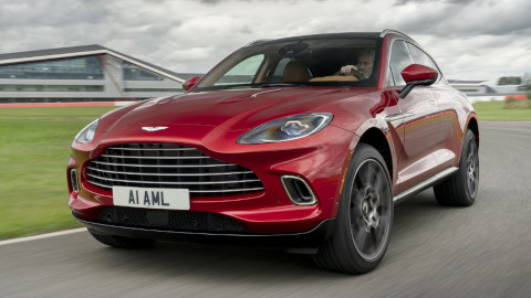 Red Aston Martin DBX Exterior Front Driving