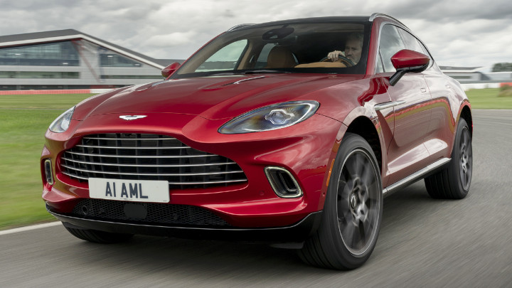 Red Aston Martin DBX Exterior Front Driving