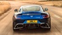 Blue Aston Martin Vanquish S Exterior Rear Driving