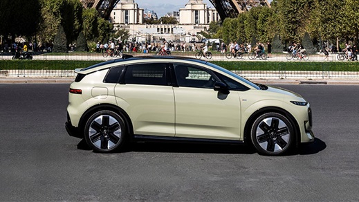 Green Audi A2 e-tron driving