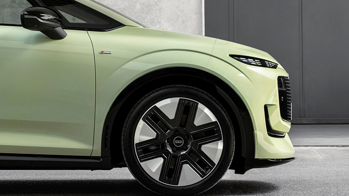 Green Audi A2 e-tron side close up