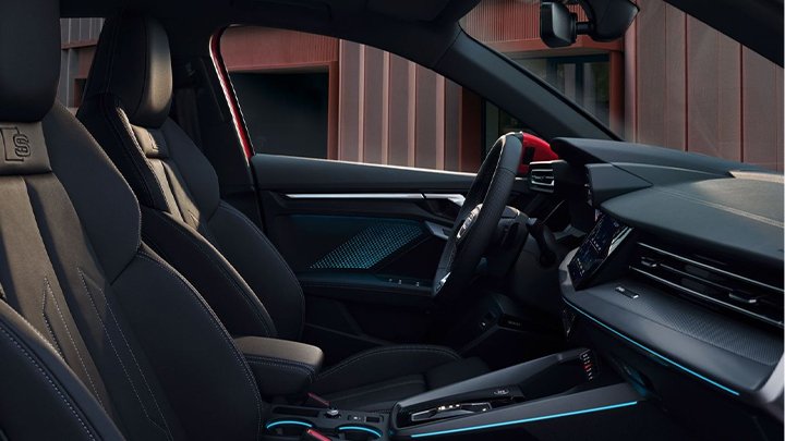 Interior shot of an Audi A3 Saloon, showing the seats and steering wheel