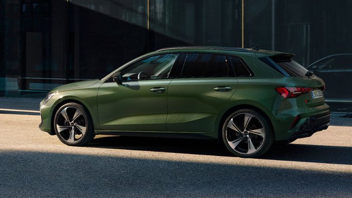 Rear quarter shot of a driving Audi A3 Sportback