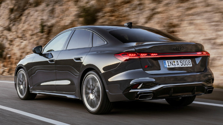 Audi A5 Saloon Rear Angle in Grey Driving