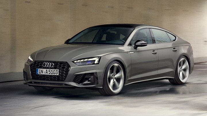 Front quarter driving shot of a grey Audi A5 Sportback