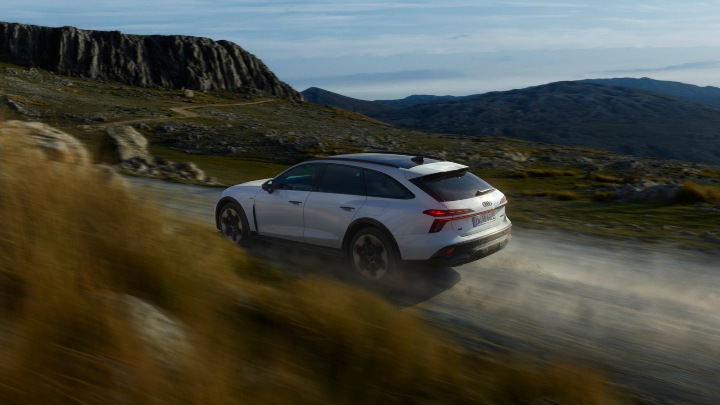 Audi A6 Allroad hybrid electric driving off-road