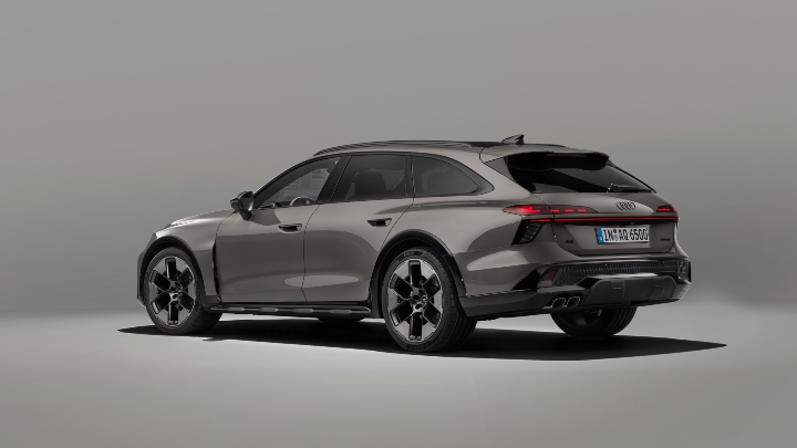 Rear three-quarter view of a grey Audi A6 allroad quattro with distinctive LED taillights