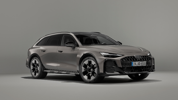 Front three-quarter view of a grey Audi A6 allroad quattro showcasing its rugged estate design