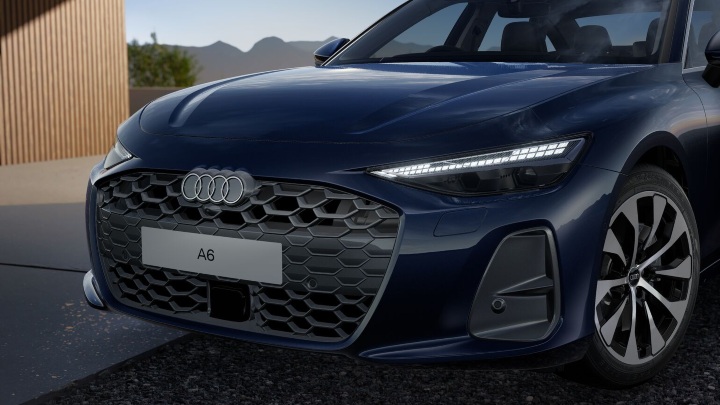 Dark Blue Audi A6 Saloon front end close up