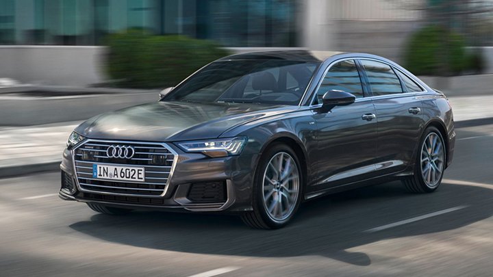 Front quarter driving shot of a grey Audi A6 Saloon