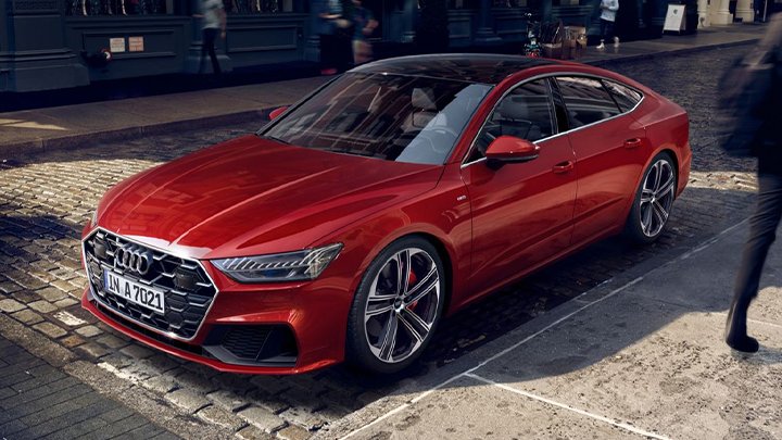 Front quarter shot of a parked Audi A7 Sportback finished in red