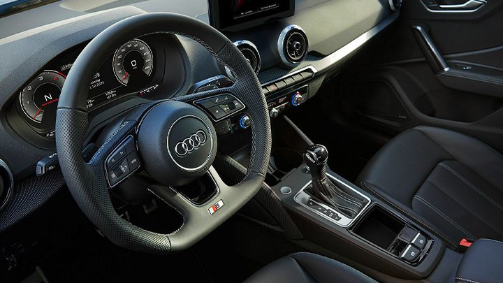 Close up of an Audi Q2's steering wheel and centre console