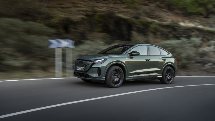 Audi Q4 Sportback e-tron driving green