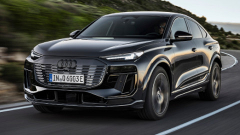 Audi Q6 Sportback e-tron Driving in Dark Grey Front Angle