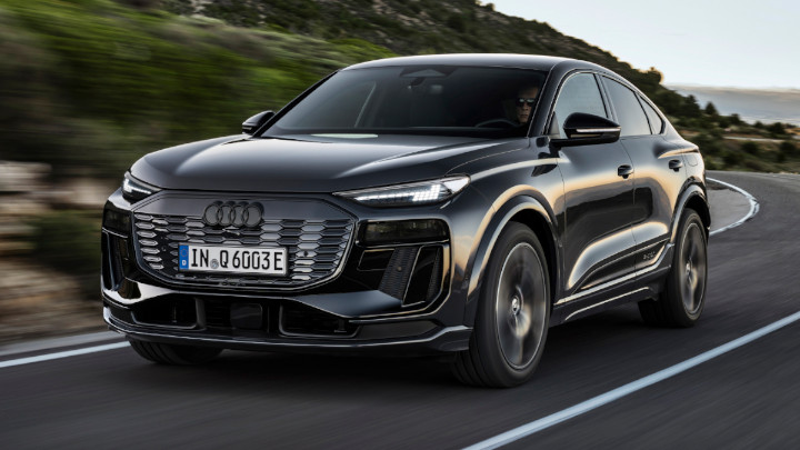 Audi Q6 Sportback e-tron Driving in Dark Grey Front Angle