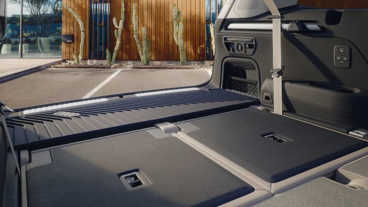 Audi Q7 boot space with rear seats folded, showing large luggage capacity