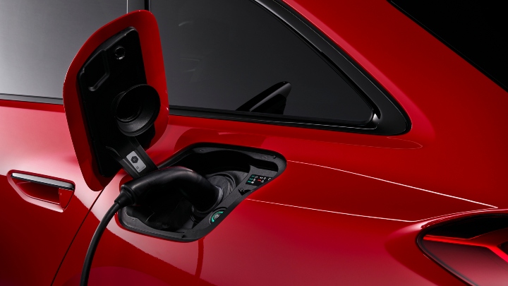 Red Audi RS 5 Avant charging