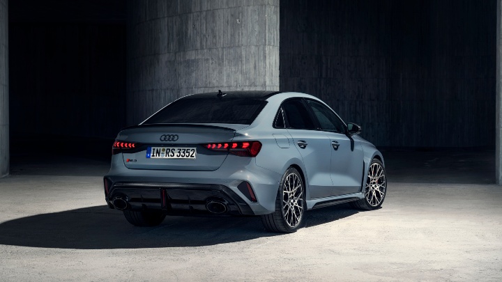 Grey Audi RS 3 Saloon parked in a modern underground concrete setting