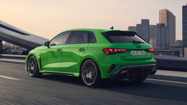 Green Audi RS3 Sportback Rear Driving Over Bridge