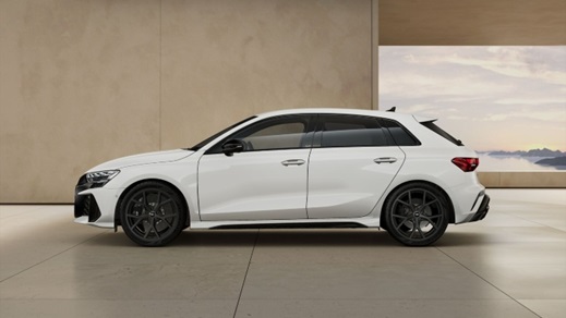 Side profile of a white Audi RS 3 Sportback showcasing its sporty design and black alloy wheels
