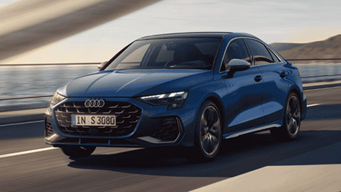 Front quarter driving shot of a blue Audi S3 Saloon