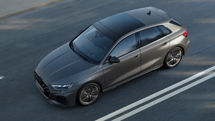 Sunroof of grey Audi S3 Sportback that is parked on the asphalt