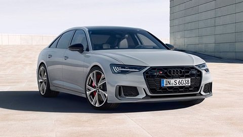 Grey Audi s6 Saloon parked in front of a grey wall