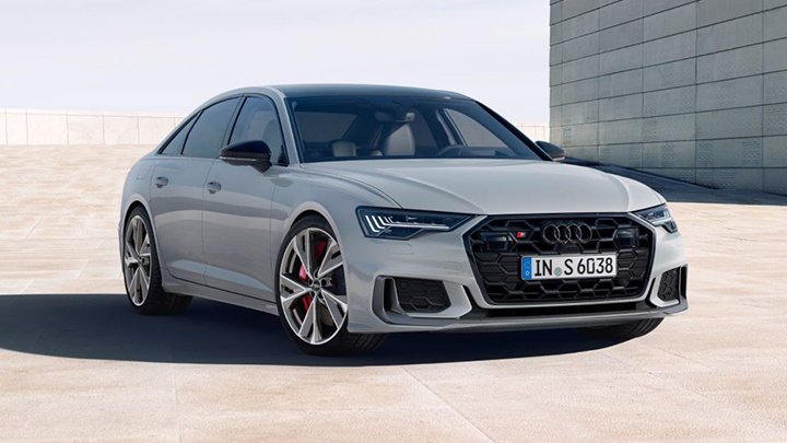 Grey Audi s6 Saloon parked in front of a grey wall