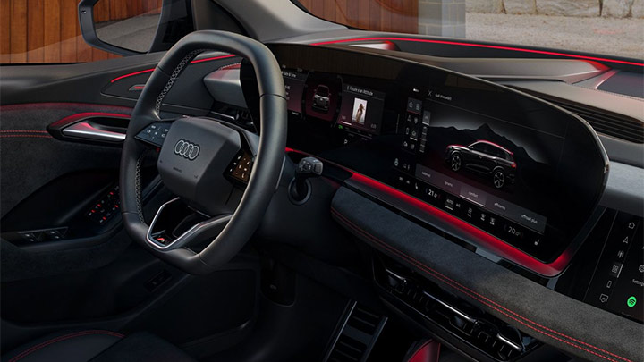 Audi SQ6 e-Tron cabin. There are red details on the dashboard just above the steering wheel