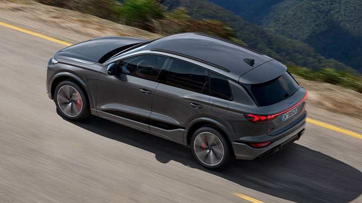 Picture above the Audi SQ6 e-Tron where a large mountainy valley can be seen