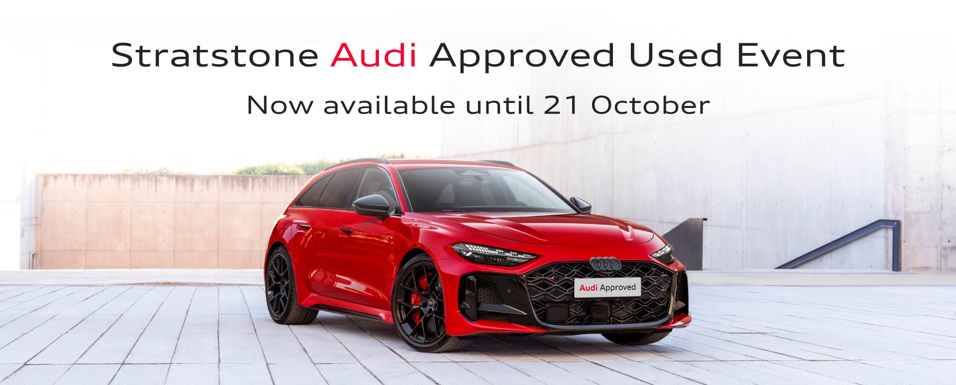 Red Audi Parked In Concrete Surroundings