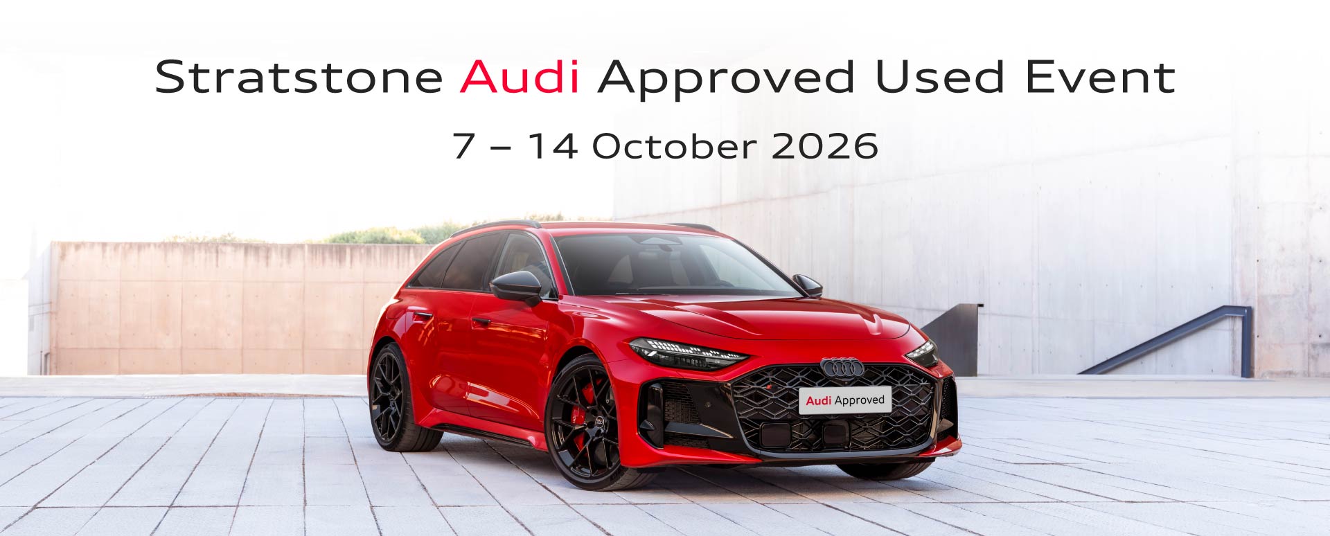 Red Audi Parked In Concrete Surroundings