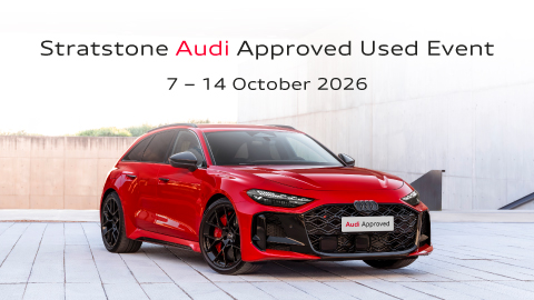 Red Audi Parked In Concrete Surroundings