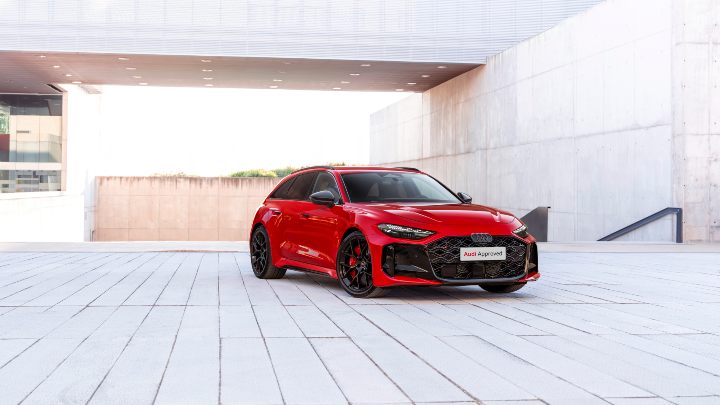 Red Audi Parked In Concrete Surroundings
