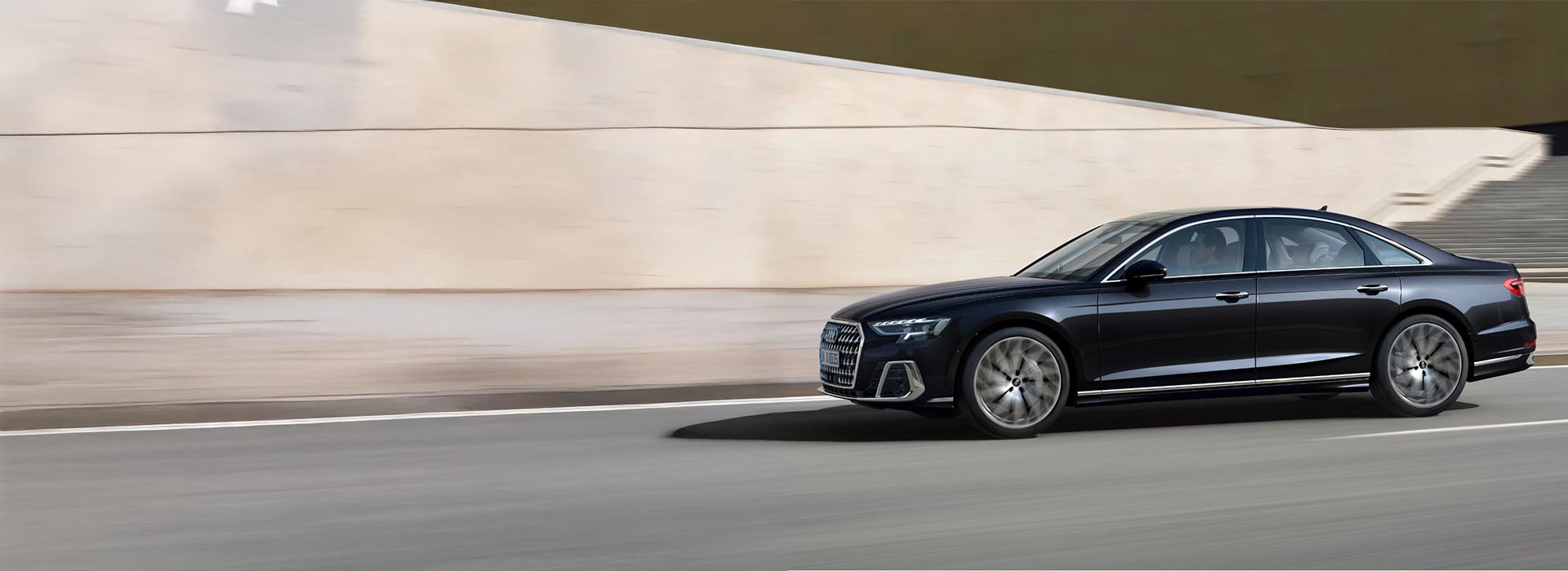 Black Audi A8 Side Driving