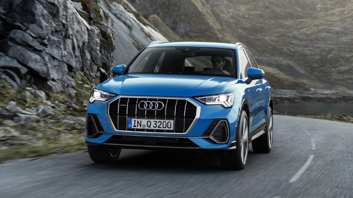 Blue Audi Q3 Driving