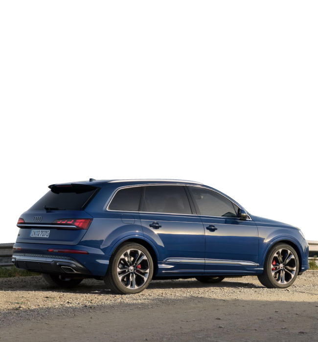 Blue Audi Q7 in a white background