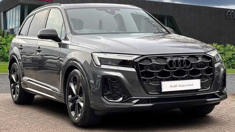 Audi Q7 Black edition parked in front of a dealership