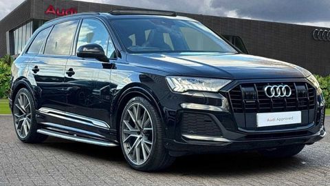 Audi Q7 Vorsprung parked in front of a dealership