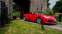 Porsche Boxster Spyder in red.