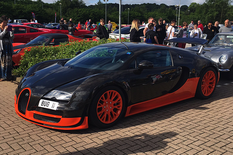 Black and orange Bugatti Veyron 16.4 Super Sport World Record Edition at Car Cafe.