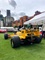 Rear view of a yellow Lotus 99T at London Concours 2019.