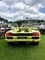 View of the back of a Lamborghini Diablo in yellow at London Concours 2019.